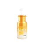 Frasco de suero iluminador facial Epidermique Éclarifie con vitamina C natural, tapa dorada y envase ámbar de 30 ml.