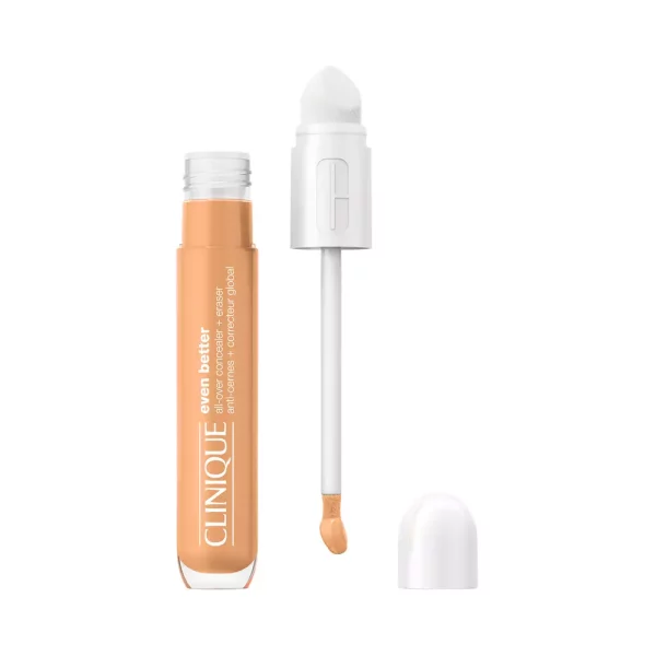 Corrector líquido tono medio Clinique Even Better All-Over Concealer + Eraser con aplicador de esponja blanco.